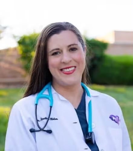 Dr. Analisa Weber women vet smiling outside