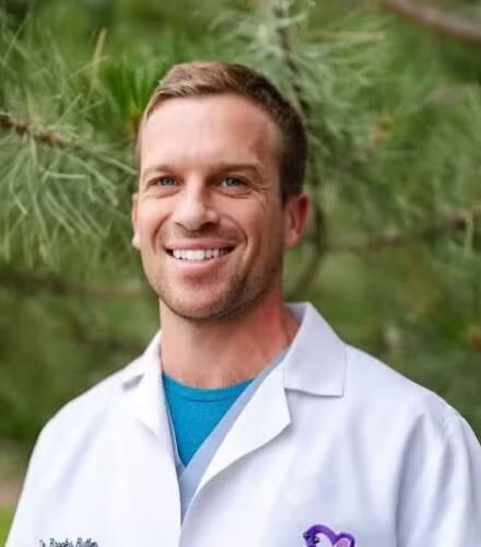 Dr. Brooks Butler Doctor smiling outside