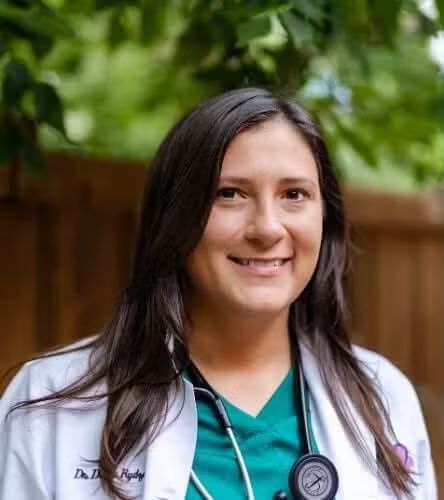 Dr. Diana Turkal women vet smiling outside